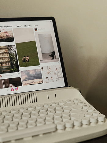 vintage-style tablet, keyboard setup, cozy workspace, social media browsing, vintage keyboard, tablet display, quiet workspace, nostalgic design, minimalist aesthetic