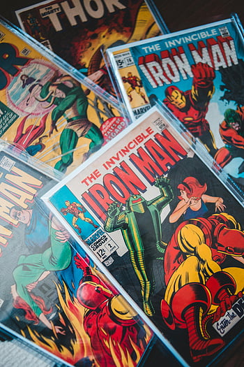 Iron Man, Thor, vintage comics, comic books, Marvel, close-up shot, vibrant comics, retro comics, comic book covers, superhero comics, comic collection
