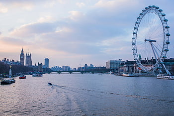 London Eye, River Thames, Big Ben, scenic evening view, London landmarks, city skyline, urban landscape, famous attractions, travel destination, UK tourism, evening cityscape