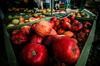 red apples, market stall, Ludwigsburg Germany, fresh produce, close-up photography, abundance, freshness, fruit display, apple variety, outdoor market, healthy eating
