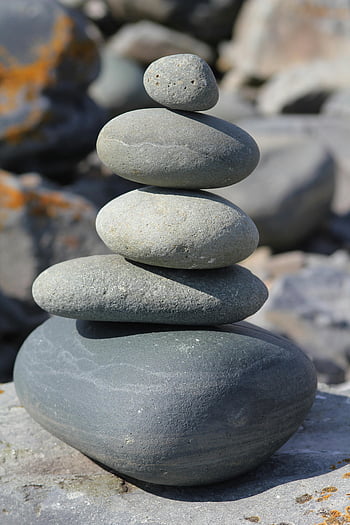 gray cairn stone, close-up photography, stacked stones, harmonious balance, simplicity, tranquility, nature, balanced stones, outdoor photography, natural elements, pebble stack