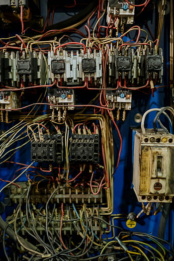 electrical wires, conductors, wiring panel, cables, connectors, close-up view, intricate wiring, electrical panel, electrical components, electrical system, electrical connections
