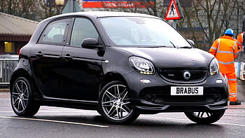black Renault Twingo, 5-door hatchback, parked on road, urban street, road construction workers, sleek black car, Brabus, compact car, city car, street scene, road workers