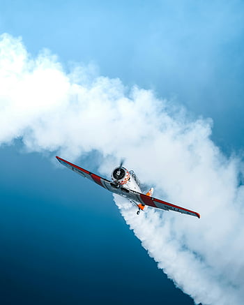 volo aereo, cielo blu, aereo sportivo, acrobatica aerea, pista di fumo, cielo blu vibrante, Performance dell'aeromobile, acrobazie aeree, Aereo in cielo, fotografia aeronautica, aereo da paracadutismo