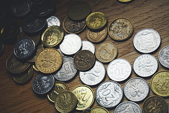 Polish coins, close-up coins, wooden table, currency concepts, finance concepts, various coins, Polish currency, coin collection, money photography, coin photography, Polish money