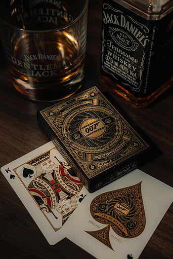 jack-daniels-whiskey-bottle-playing-cards-stylish-display-elegant-ambiance-indoor-setting-tennessee-whiskey-gentleman-jack-007-playing-cards-whiskey-glass-thumbnail.jpg