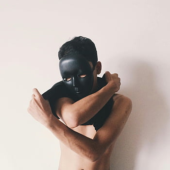 - black mask portrait, masked men, surreal art, minimalistic photography, abstract expression, anonymous figure, dark mask, conceptual portrait, artistic expression, shadow and light, symbolic photography.