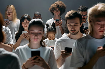 people engaged on phones, diverse group, engrossed smartphones, modern social connectivity, social media addiction, technology use, group interaction, smartphone users, digital engagement, focused individuals, contemporary lifestyle