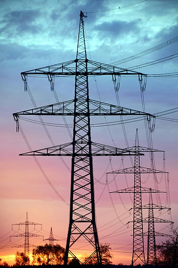 electricity pylons, black electric tower, blue sky, sunset sky, high voltage transmission, dramatic sky, power lines, transmission towers, silhouette, utility poles, energy infrastructure