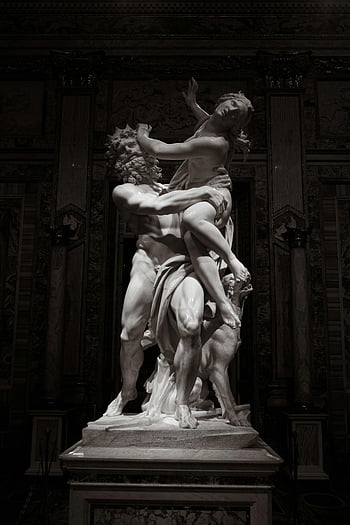 Renaissance, marble sculpture, intricately carved, dimly lit, museum setting, Renaissance art, sculpture, art, museum, historical, statue