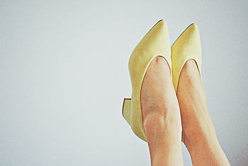 yellow high heels, pointed-toe flats, women's shoes, chic footwear, minimalistic backdrop, fashion concepts, close-up photography, stylish shoes, yellow shoes, elegant footwear, high heel fashion