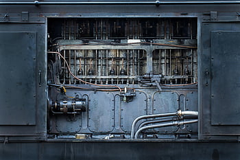industrial machinery, metal pipes, complex machinery, gray machine, detailed view, industrial parts, machinery parts, industrial equipment, mechanical components, industrial design, industrial technology