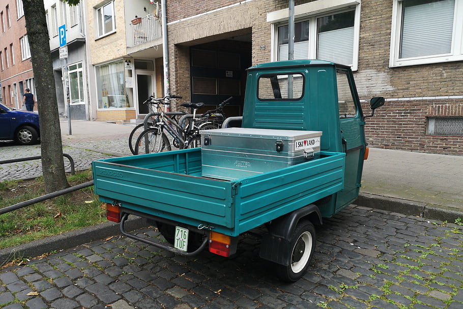 Piaggio, APE, truck, teal, vehicle, cooler, bicycles, urban, street, parked, building
