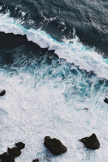 aerial view, ocean waves, coastal rocks, dramatic seascape, breaking waves, aerial photography, ocean photography, seascape photography, natural beauty, coastal scenery, wave patterns