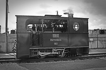 gray scale photo, classic train, vintage steam locomotive, railway track, nostalgic black and white, Plettenberg, DEV, steam engine, train station, railway history, locomotive engine