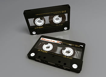 černá a bílá kazeta, TDK SA-X 60, Vintage kazetové pásky, Retro zvuková technologie, odrazný povrch, audiokazeta, kazeta tdk, SA-X 60, Vintage zvuk, retro technologie, kazetová páska