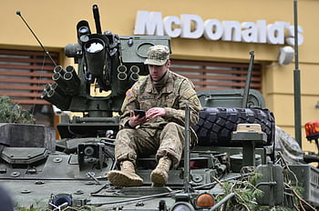 soldier, camouflage, sitting, tank, armored vehicle, smartphone, McDonald's, military, uniform, resting, outside