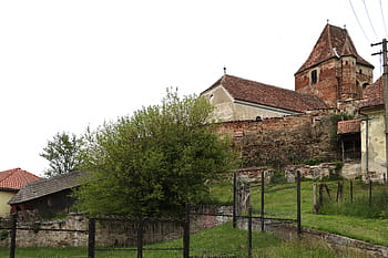 Buzd, opevněný kostel, gotický styl, kamenné desky, točité schodiště, záclonové stěny, opevnění, farní dům, zemětřesení, 14. století, SIBIU COUNTY