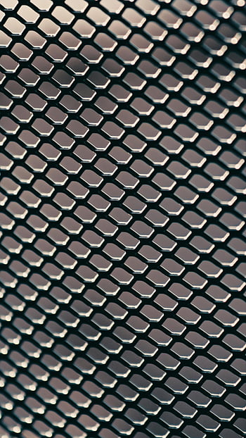 metal fence, small chain links, geometric metal mesh, dynamic lighting, shadows, detailed view, metal mesh, chain link fence, geometric pattern, metal texture, shadow effect