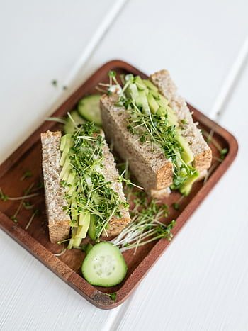 vegetable sandwich, cucumber slices, sprouts, close-up photograph, wooden plate, healthy food, avocado sandwich, fresh vegetables, sandwich with sprouts, sandwich with cucumber, delicious sandwich