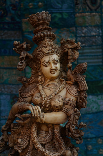 hinduistické božstvo, náboženské sochy, složité detaily, duchovní podstata, detailní pohled, Hinduistické umění, socha božstva, Kulturní artefakt, Tradiční socha, indické umění, duchovní postava