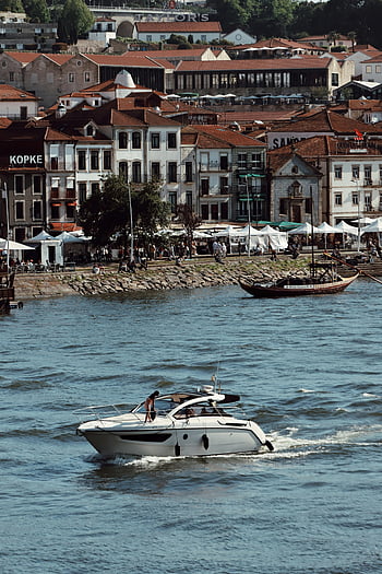 Porto, Douro River, motorboat, historic buildings, Portugal, cruising, waterfront, cityscape, Kopke, Taylor's, riverbank