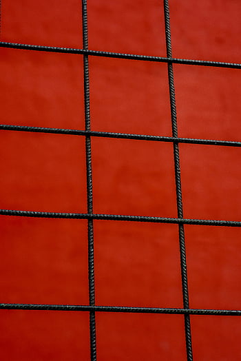 minimalist wire grid, red background, abstract design, vibrant red, bold design, minimalist design, wire mesh, grid pattern, modern art, geometric pattern, abstract photography