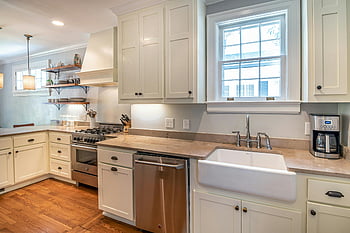 kitchen interior, bright kitchen, wooden floors, modern white cabinetry, farmhouse sink, stainless steel appliances, open shelving, natural light, contemporary kitchen, clean design, kitchen design