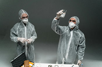 scientists, PPE, lab experiment, indoor lab, lab equipment, protective gear, laboratory, experiment setup, two scientists, indoor setting, lab work