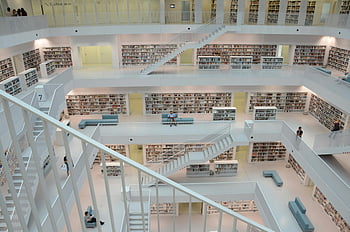 library interior, white staircases, bookshelves, modern architecture, contemporary library, interior view, white library, bookshelves design, library design, modern library, white bookshelves