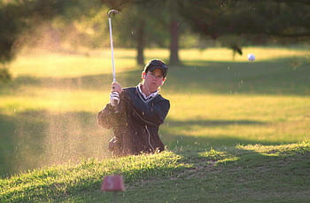 golf, man playing golf, golf course, golf swing, golf club, golf ball, outdoor sports, green grass, golf player, golfing action, golf tournament