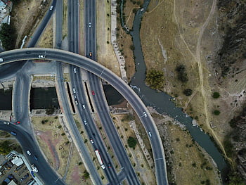 aerial photography, roads, highway intersection, Chihuahua, city infrastructure, aerial view, complex highways, urban planning, transportation network, road design, infrastructure development