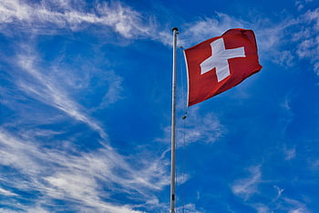 Swiss flag, Flag of Switzerland, Grindelwald, vivid blue sky, waving flag, mast, red and white, Swiss emblem, outdoor scene, European flag, alpine region