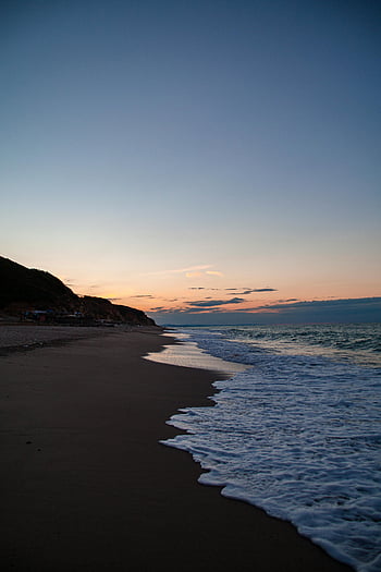 Shoreline i skumringen, Serene Beach, solnedgang udsigt, Ormanlı İstanbul, Fredelige bølger, farverige himmel, strand solnedgang, kystnære scene, aften strand, Tranquil farvande, Seaside Dusk