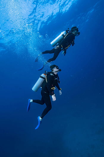 scuba divers, masks, snorkeling, underwater, vibrant underwater world, Isla Mujeres, Mexico, scuba diving, ocean, bubbles, exploration