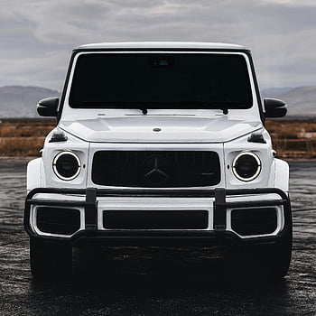 bílý Mercedes třídy G, čelní pohled, Robustní design, Venkovní parkování, suv, mercedes-benz, luxusní vozidlo, terénní, moderní design, bílé auto, g-vůz