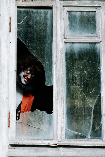 sinister clown, shattered window, terrifying clown, cracked window, eerie Halloween, horror, spooky clown, creepy clown, Halloween horror, scary clown, broken window
