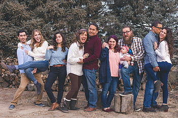 family photo, joyful family, fall day, green tree, outdoor photo, expressing love, happiness, group photo, family gathering, autumn photo, nature background