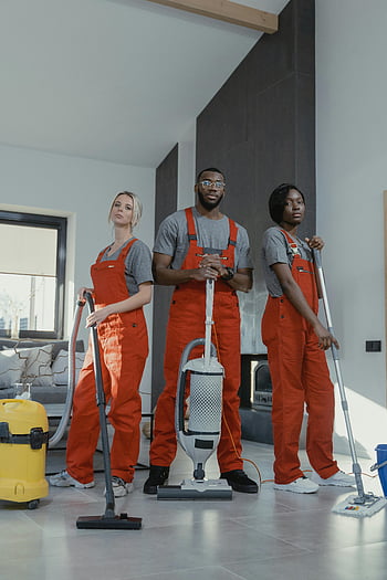 cleaners, uniform, equipment, modern home, teamwork, professionalism, vacuum cleaner, mopping, orange overalls, interior cleaning, cleaning service