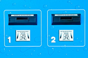 vending machine, bill acceptors, payment instructions, blue background, close-up shot, insert money, vending machine details, payment slots, vending machine interface, bill insertion, vending machine close-up