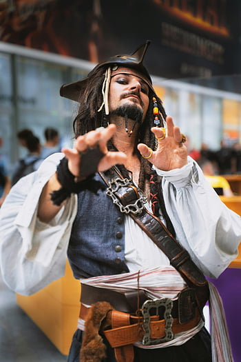 pirate costume, cosplay, indoor event, detailed costume, pirate cosplay, man in costume, pirate outfit, costume party, pirate character, cosplay event, pirate attire