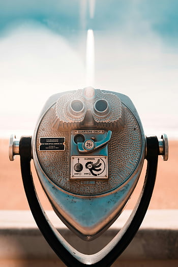coin-operated binoculars, vintage binoculars, San Francisco, quarters only, tourist attraction, outdoor viewing, public binoculars, cityscape view, tourist binoculars, coin-operated viewing, vintage optics