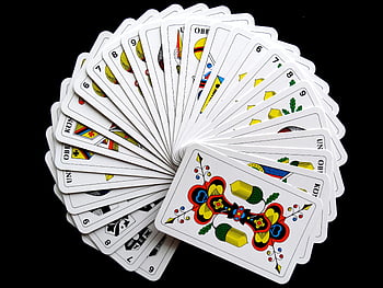 playing cards, white cards, yellow cards, fanned out, black background, vibrant cards, artistic cards, card design, card art, card pattern, card spread