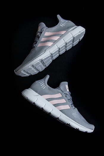 gray sneakers, women's training shoes, modern sneakers, gray and pink, black background, athletic footwear, casual shoes, sporty design, women's shoes, training sneakers, comfortable sneakers