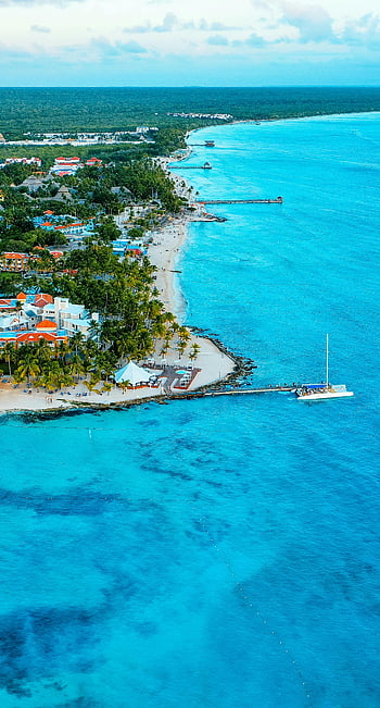 Bayahíbe, Dominican Republic, turquoise coastline, resort area, aerial view, seaside hotels, beach, top view, Dominican Republic beaches, coastal view, tropical destination