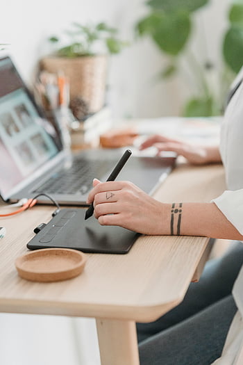 graphic design, tablet, laptop, modern office, woman working, graphic tablet, office workspace, digital art, creative workspace, desk setup, plant decor
