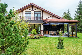 modern cottage, green backyard, contemporary home, lush garden, modern design, serene countryside, family home, outdoor patio, green lawn, country house, modern architecture