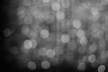 bokeh effect, black and white, abstract background, blurred lights, circular bokeh, monochrome, out of focus, light circles, bokeh pattern, soft focus, abstract photography