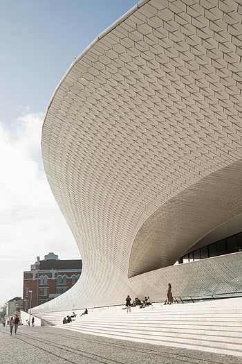 MAAT Museum, Lisbon, modern design, iconic architecture, visitors, art museum, architecture museum, technology museum, sleek design, contemporary building, Portugal