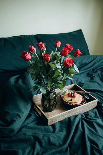 breakfast in bed, red roses, pancakes with berries, wooden tray, cozy setting, bed setting, flowers on tray, breakfast tray, morning breakfast, romantic breakfast, bed breakfast